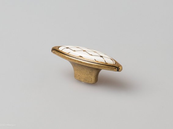 Cosmopolitan мебельная ручка-кнопка состаренное золото с белой керамической вставкой со стеганым орнаментом